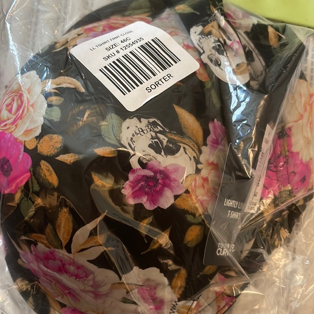 NWT. Torrid bra. Floral and skulls.